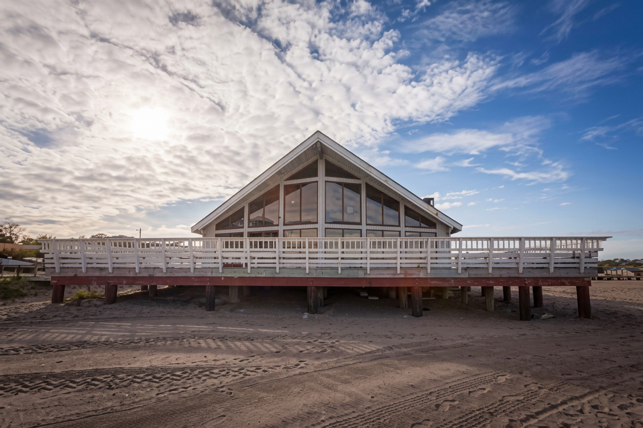 The Pavilions at Penfield Beach exterior at sunset